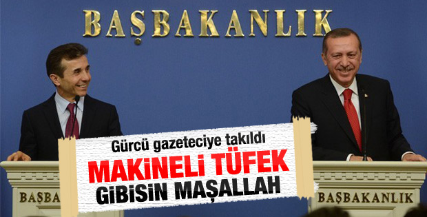 Erdoğan'dan Gürcü gazeteciye: Makineli tüfek gibisin