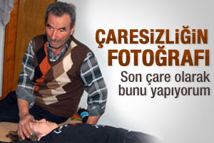 Özürlü kızını yatağa bağlıyor