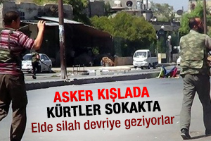 Kürt gençleri elde silah devriye geziyor
