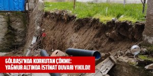 GÖLBAŞI’NDA KORKUTAN ÇÖKME: YAĞMUR ALTINDA İSTİNAT DUVARI YIKILDI!