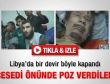 Kaddafi'nin cesedi önünde poz verdiler - İzle